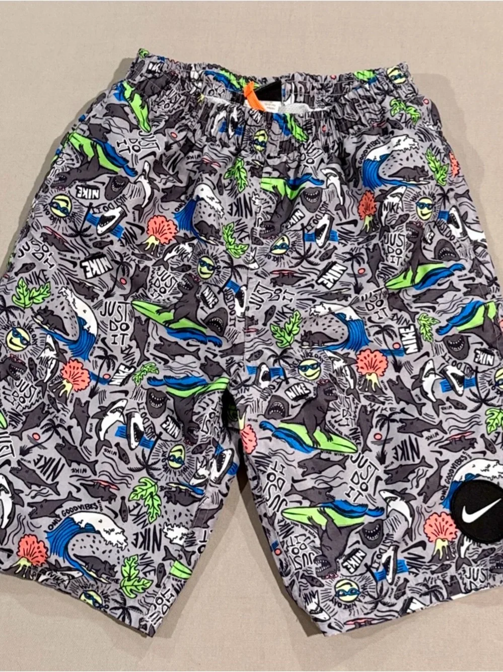 Nike Kids Gray Swim Trunks with Bright Graphic Print